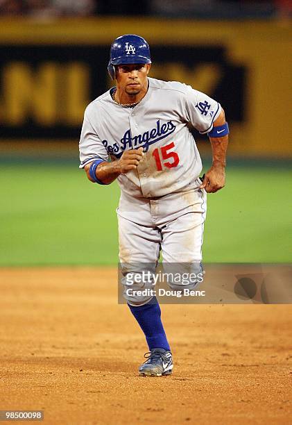 Rafael Furcal of the Los Angeles Dodgers runs the bases against the Florida Marlins during the Marlins home opening game at Sun Life Stadium on April...