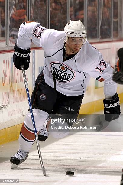 Andrew Cogliano of the Edmonton Oilers controls the puck alongside the boards against Anaheim Ducks during the game on April 11, 2010 at Honda Center...