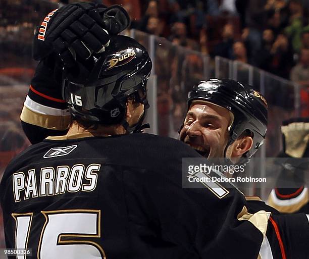 Kyle Chipchura and George Parros of the Anaheim Ducks celebrate a goal in the third period from George Parros against the Edmonton Oilers during the...