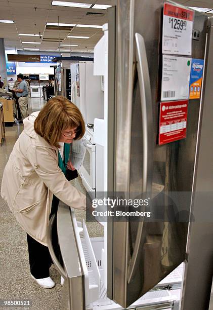 Kathy Patrick, of Downers Grove, Illinois, looks at a Kenmore refrigerator during an Energy Star rebate program for home appliances at a Sears store...