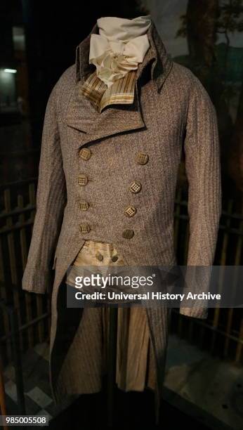 Coat and waistcoat, About 1790, England. Coat: Wool with buttons covered with silk thread. Waistcoat: printed silk.
