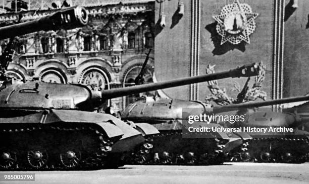 Photograph taken during Moscow's May Day Parade showing heavy tanks, representing their armed might. Dated 20th Century.