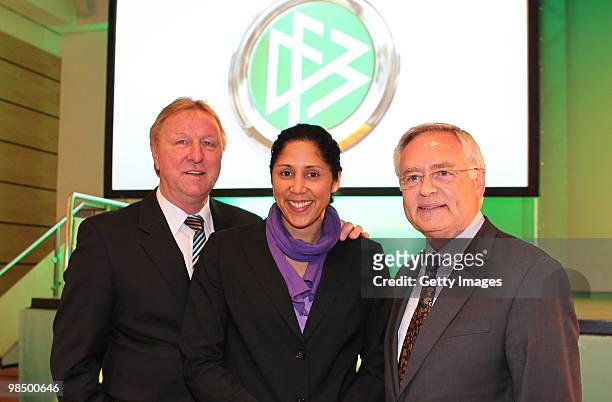 Horst Hrubesch , coach of DFB, Steffi Jones , president of organisation of Women's world championships 2011 and Horst R. Schmidt, Chairman of the...