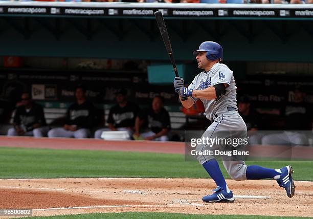 Reed Johnson of the Los Angeles Dodgers follows through after making contact against the Florida Marlins at Sun Life Stadium on April 11, 2010 in...