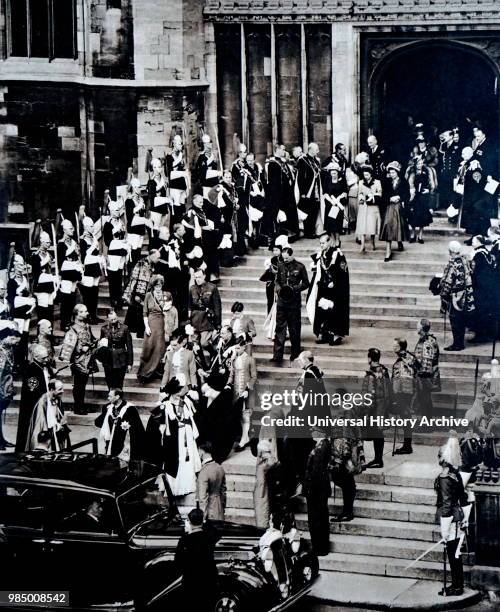 Photograph of Queen Elizabeth II and Prince Philip, The Duke of Edinburgh on their Silver Wedding Anniversary. Also pictured is Prince Charles and...