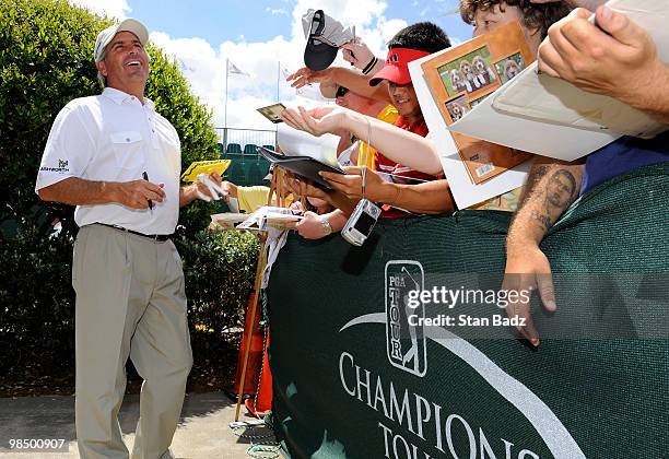 Fred Couples signs autographs for fans after the first round of the Outback Steakhouse Pro-Am at TPC Tampa Bay on April 16, 2010 in Lutz, Florida.