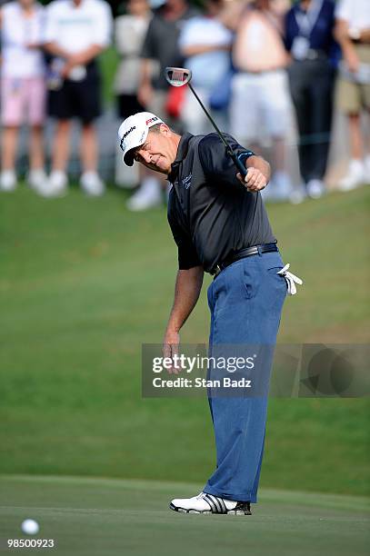 Fred Funk watches his putt on the 16th green during the first round of the Outback Steakhouse Pro-Am at TPC Tampa Bay on April 16, 2010 in Lutz,...