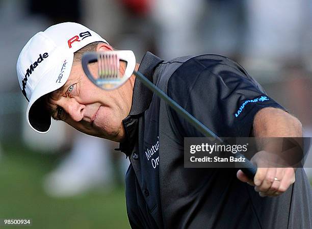 Fred Funk watches his putt on the 16th green during the first round of the Outback Steakhouse Pro-Am at TPC Tampa Bay on April 16, 2010 in Lutz,...