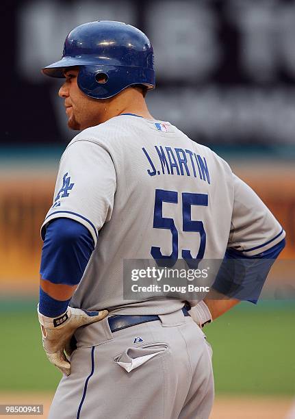 Catcher Russell Martin of the Los Angeles Dodgers stands on first after getting a hit against the Florida Marlins at Sun Life Stadium on April 11,...