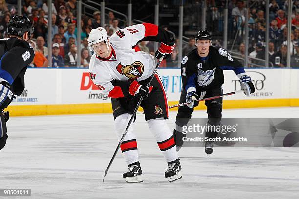 Jason Spezza of the Ottawa Senators passes the puck against the Tampa Bay Lightning at the St. Pete Times Forum on April 8, 2010 in Tampa, Florida.