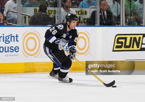 Martin St. Louis of the Tampa Bay Lightning skates with the puck against the Ottawa Senators at the St. Pete Times Forum on April 8, 2010 in Tampa,...