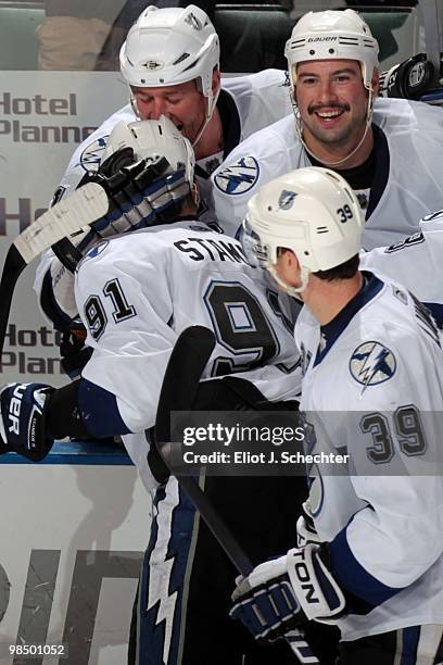 Steven Stamkos of of the Tampa Bay Lightning celebrates with teammates tying Sidney Crosby for the NHL league lead in goals at 51 to share the...
