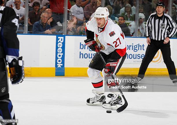 Alexei Kovalev of the Ottawa Senators passes the puck against the Tampa Bay Lightning at the St. Pete Times Forum on April 8, 2010 in Tampa, Florida.