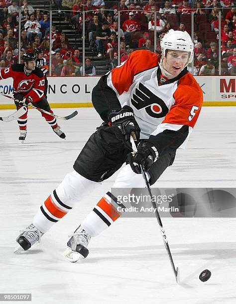 Braydon Coburn of the Philadelphia Flyers plays the puck against the New Jersey Devils in Game One of the Eastern Conference Quarterfinals during the...