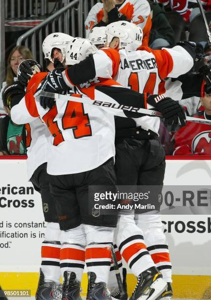 The Philadelphia Flyers celebrate a second period goal against the New Jersey Devils in Game One of the Eastern Conference Quarterfinals during the...