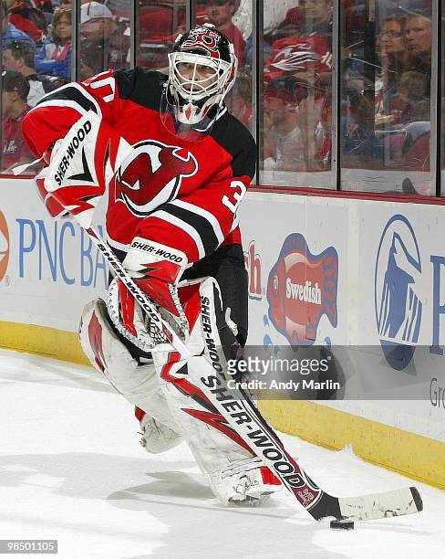 Martin Brodeur of the New Jersey Devils plays the puck against the Philadelphia Flyers in Game One of the Eastern Conference Quarterfinals during the...