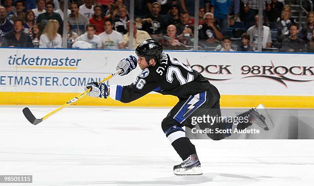 Martin St. Louis of the Tampa Bay Lightning shoots the puck against the Ottawa Senators at the St. Pete Times Forum on April 8, 2010 in Tampa,...