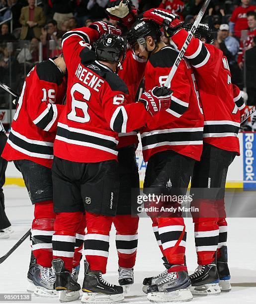 The New Jersey Devils celebrate a late third period goal against the Philadelphia Flyers in Game One of the Eastern Conference Quarterfinals during...