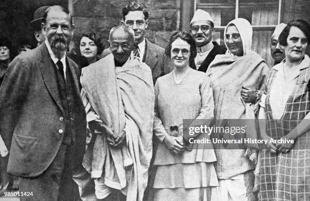 Group photograph taken at Marseilles in France 1931: C. F. Andrews, Gandhi, Miss Muriel Lester, Mahadev Desai, Madeleine Slade , Pyarelal and an...