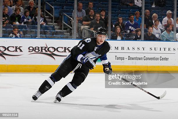 Steven Stamkos of the Tampa Bay Lightning skates to the puck against the Ottawa Senators at the St. Pete Times Forum on April 8, 2010 in Tampa,...