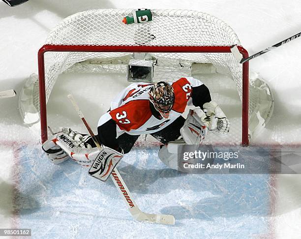 Brian Boucher of the Philadelphia Flyers defends his net against the New Jersey Devils in Game One of the Eastern Conference Quarterfinals during the...