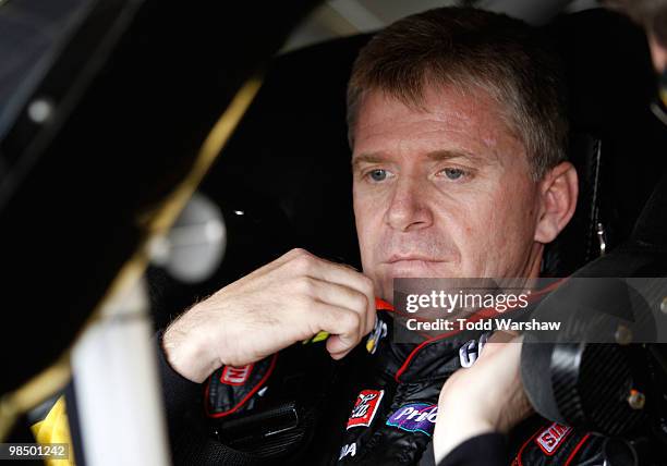 Jeff Burton, driver of the Caterpillar Chevrolet, sits in his car during practice for the NASCAR Sprint Cup Series Samsung Mobile 500 at Texas Motor...