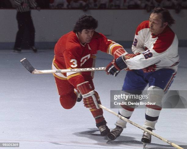 Pat Quinn of the Atlanta Flames skates against the Montreal Canadiens in the 1970's at the Montreal Forum in Montreal, Quebec, Canada.