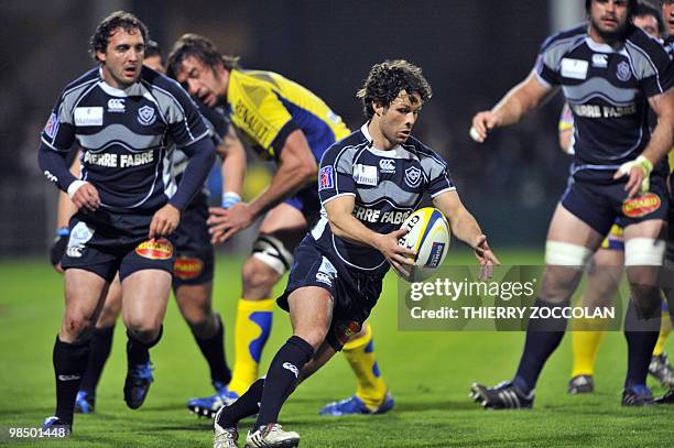 Castres' French scrum-half Alexandre Albouy kicks the ball during the French Top 14 rugby union match Clermont versus Castres at the Marcel Michelin...