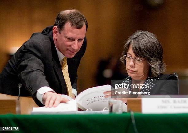Sheila Bair, chairwoman of the Federal Deposit Insurance Corporation , speaks to an aide during a Permanent Investigations Subcommittee hearing on...