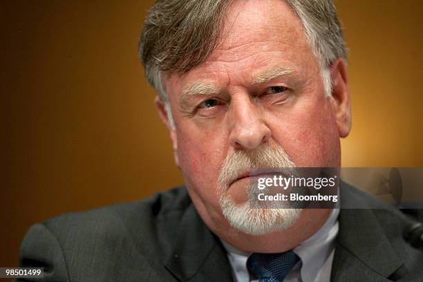 John Bowman, acting director of the Office of Thrift Supervision , listens during a Permanent Investigations Subcommittee hearing on Wall Street and...