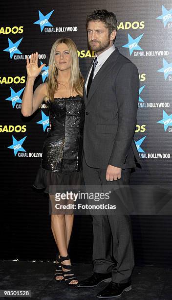 Actress Jennifer Aniston and actor Gerard Butler attend the premiere of "The Bounty Hunter" at Callao Cinema on March 30, 2010 in Madrid, Spain.