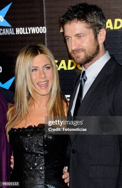 Actress Jennifer Aniston and actor Gerard Butler attend the premiere of "The Bounty Hunter" at Callao Cinema on March 30, 2010 in Madrid, Spain.