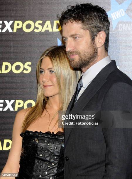 Actress Jennifer Aniston and actor Gerard Butler attend the premiere of "The Bounty Hunter" at Callao Cinema on March 30, 2010 in Madrid, Spain.