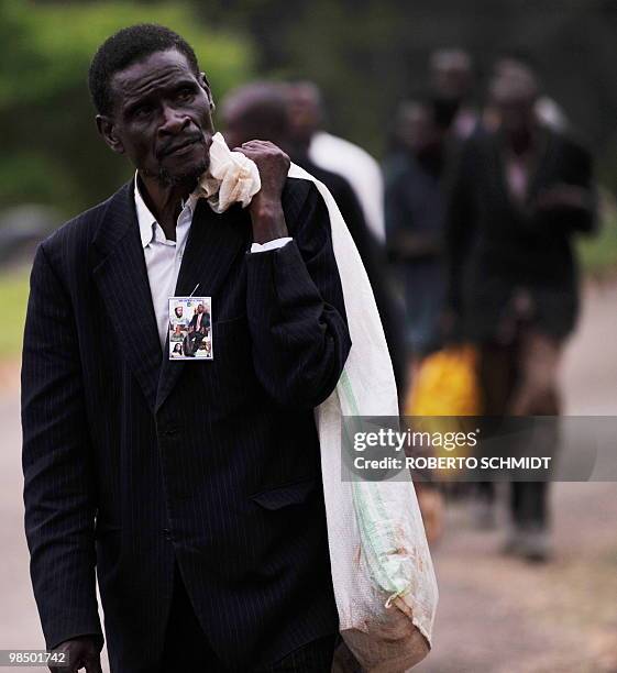 Member of a Toroo delegation arrives to the palace before King Oyo Nyimba Kabamba Iguru Rukidi IV was presented with special ceremonial drums and...