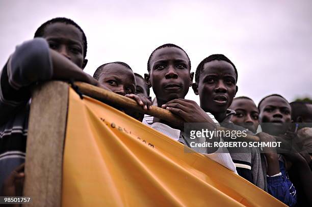 Children living in the western Ugandan town of Fort Portal, attend a ceremony in which King Oyo Nyimba Kabamba Iguru Rukidi IV presented the winners...