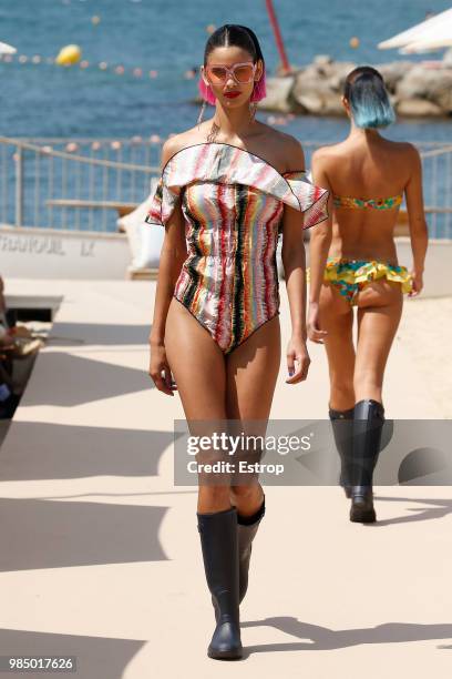 Model walks the runway at the Como un Pez en el Agua show during the Barcelona 080 Fashion Week on June 25, 2018 in Barcelona, Spain.