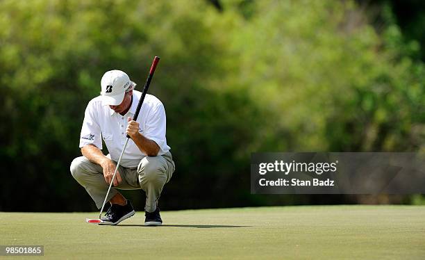 Fred Couples waits for play at the third green during the first round of the Outback Steakhouse Pro-Am at TPC Tampa Bay on April 16, 2010 in Lutz,...