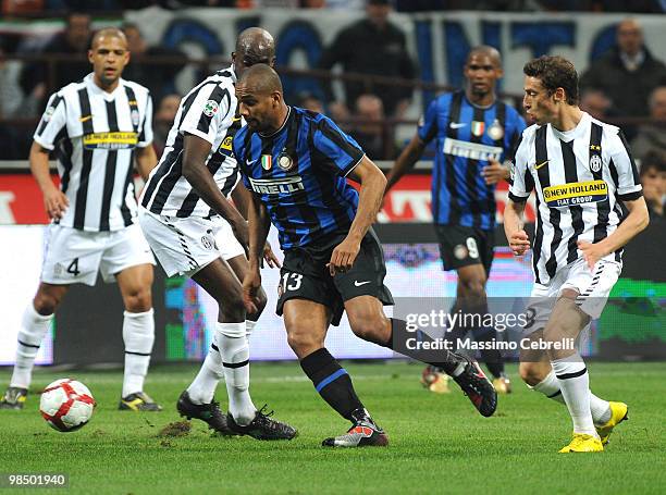Sisenando Maicon Douglas of FC Internazionale Milano surrounded by players of Juventus FC during the Serie A match between FC Internazionale Milano...