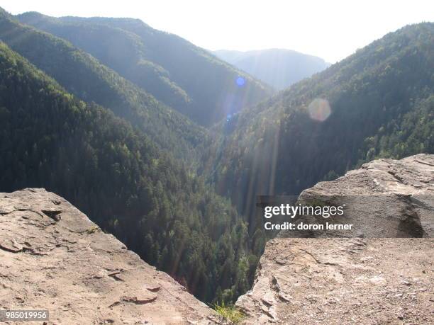 sunbeam over the valley - doron stock pictures, royalty-free photos & images