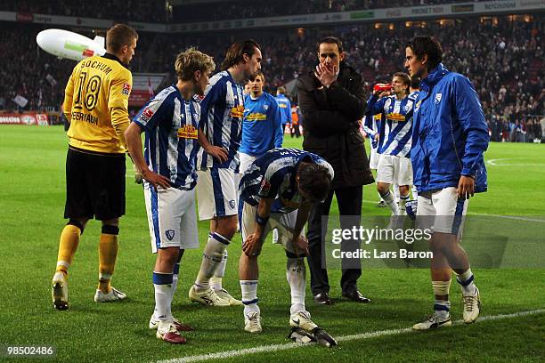 Head coach Heiko Herrlich of Bochum and his players are looking dejected after loosing the Bundesliga match between 1. FC Koeln and VfL Bochum at...