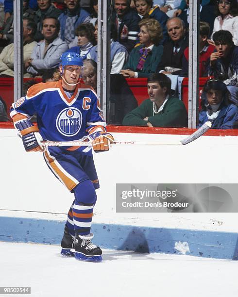 Wayne Gretzky of the Edmonton Oilers skates against the Montreal Canadiens in the 1980's at the Montreal Forum in Montreal, Quebec, Canada.