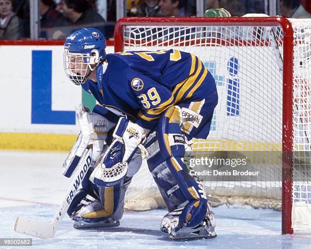 Goaltender Dominik Hasek of the Buffalo Sabres protects the net against the Montreal Canadiens in the 1990's at the Montreal Forum in Montreal,...