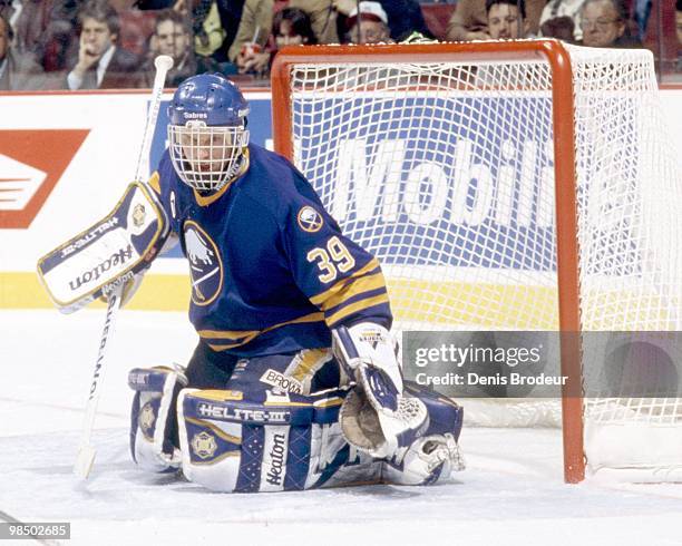 Goaltender Dominik Hasek of the Buffalo Sabres protects the net against the Montreal Canadiens in the 1990's at the Montreal Forum in Montreal,...