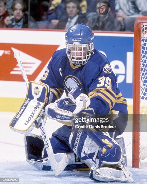 Goaltender Dominik Hasek of the Buffalo Sabres protects the net against the Montreal Canadiens in the 1990's at the Montreal Forum in Montreal,...