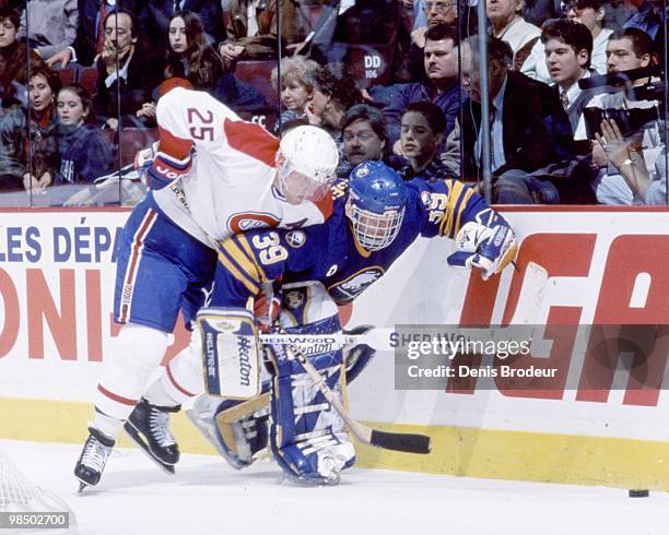 Goaltender Dominik Hasek of the Buffalo Sabres protects the net against the Montreal Canadiens in the 1990's at the Montreal Forum in Montreal,...