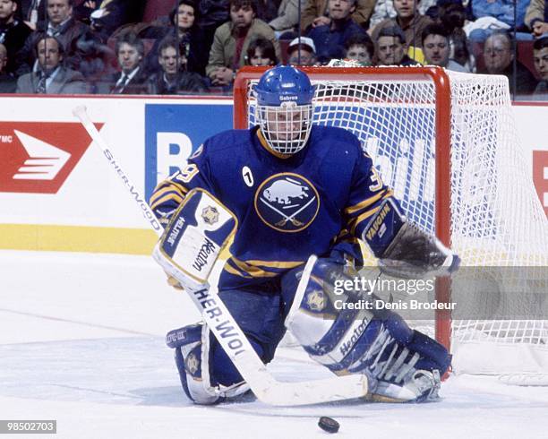 Goaltender Dominik Hasek of the Buffalo Sabres protects the net against the Montreal Canadiens in the 1990's at the Montreal Forum in Montreal,...