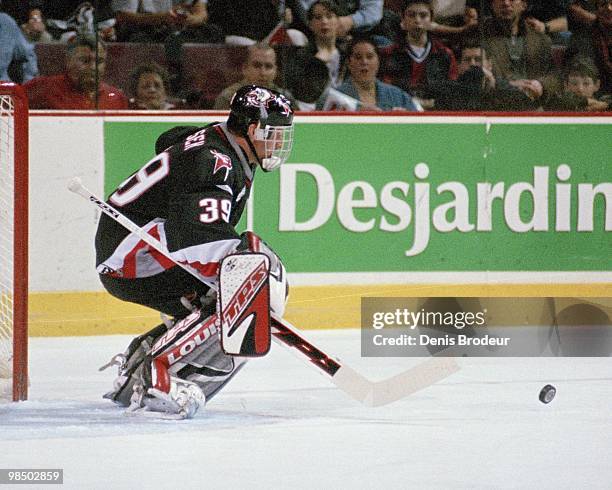 Goaltender Dominik Hasek of the Buffalo Sabres protects the net against the Montreal Canadiens in the 1990's at the Montreal Forum in Montreal,...