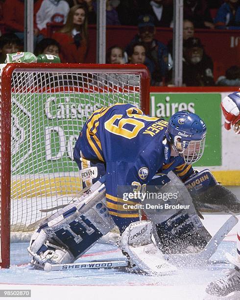 Goaltender Dominik Hasek of the Buffalo Sabres protects the net against the Montreal Canadiens in the 1990's at the Montreal Forum in Montreal,...