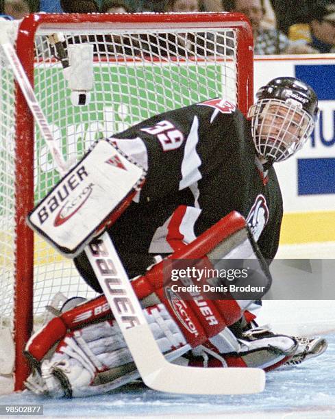 Goaltender Dominik Hasek of the Buffalo Sabres protects the net against the Montreal Canadiens in the 1990's at the Montreal Forum in Montreal,...