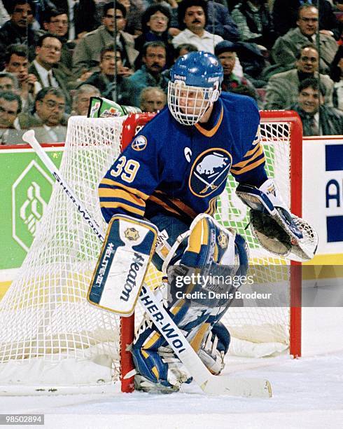 Goaltender Dominik Hasek of the Buffalo Sabres protects the net against the Montreal Canadiens in the 1990's at the Montreal Forum in Montreal,...